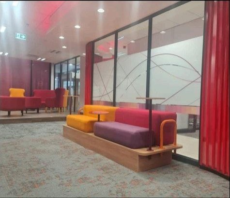 ABSA — lounge seating and glass partitions